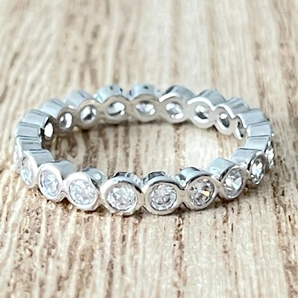 Round White Sapphire Bezel Eternity Band - 925 Sterling Silver - Picture 1 of 3